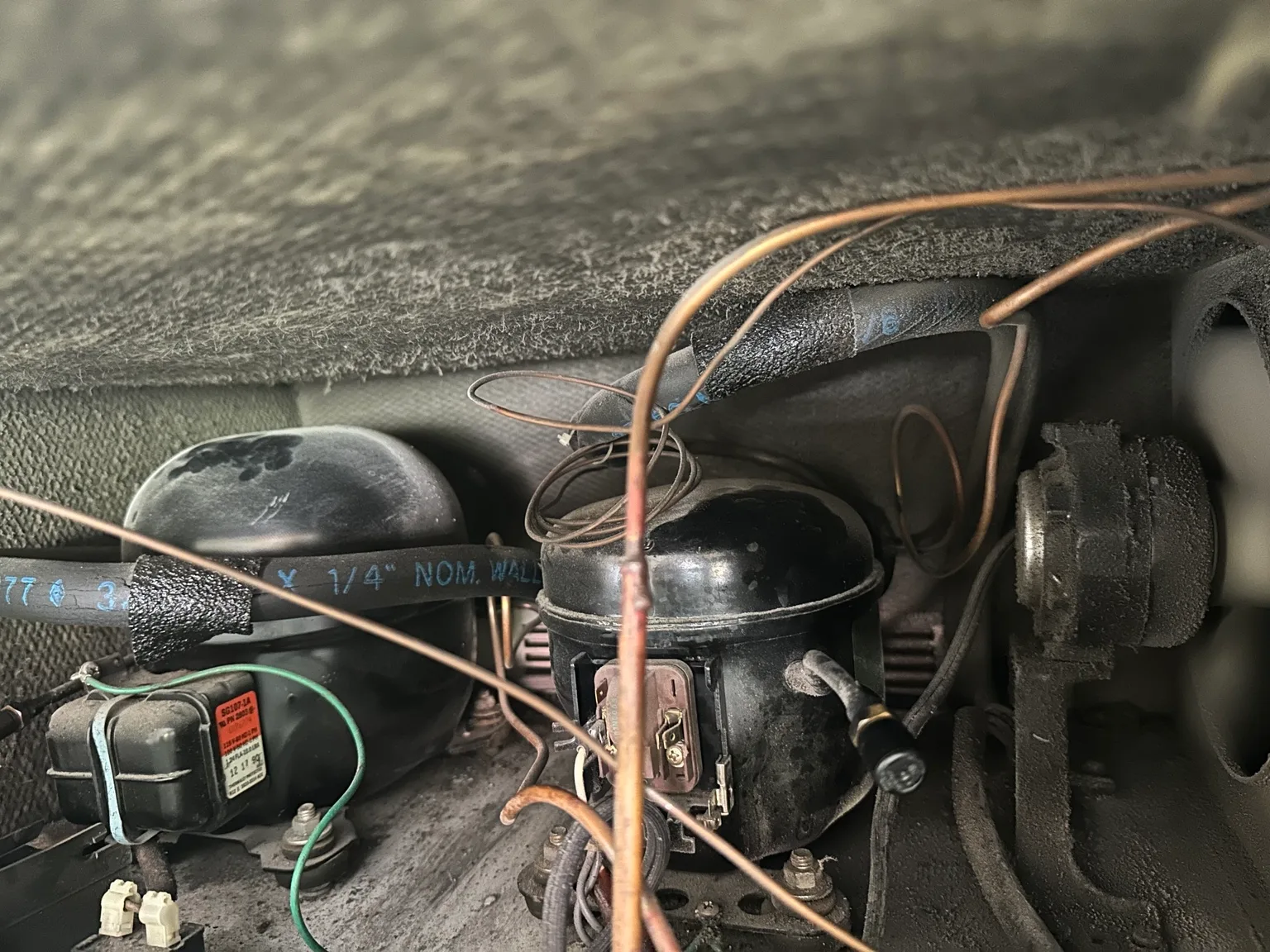 Sub-Zero compressor compartment during start relay diagnosis
